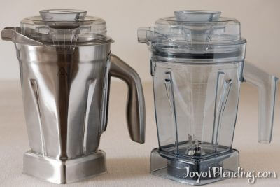 Stainless steel vitamix container next to Tritan 48-oz container